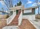 Charming home with a welcoming front porch, complemented by a well-maintained yard and inviting curb appeal at 136 Victor Nw Cir, Atlanta, GA 30314