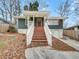 Charming home with a welcoming front porch, complemented by a well-maintained yard and inviting curb appeal at 136 Victor Nw Cir, Atlanta, GA 30314