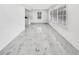 An open floorplan with lots of natural light through large windows illuminating modern flooring at 136 Victor Nw Cir, Atlanta, GA 30314