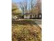 Beautiful home with a spacious front yard perfect for outdoor activities and relaxation at 1943 Main Nw St, Atlanta, GA 30318