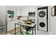 Modern kitchen with stainless steel appliances, white cabinetry, and stylish countertop at 1943 Main Nw St, Atlanta, GA 30318