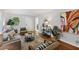 Comfortable living room showcasing hardwood floors, stylish decor, and plenty of seating at 1943 Main Nw St, Atlanta, GA 30318