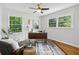 Bright home office with large windows, modern desk and stylish decor at 1943 Main Nw St, Atlanta, GA 30318