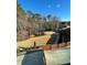 Spacious backyard with playground and lush surroundings at 3499 Lake Mill Rd, Buford, GA 30519