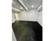 Spacious basement room with neutral walls and durable flooring, ready for customization at 3499 Lake Mill Rd, Buford, GA 30519