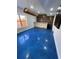 Finished basement with unique lighting and custom bar area at 3499 Lake Mill Rd, Buford, GA 30519