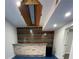 Finished basement with unique lighting and custom bar area at 3499 Lake Mill Rd, Buford, GA 30519
