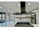 Spacious kitchen with a large island, stainless steel appliances, and great natural light at 3499 Lake Mill Rd, Buford, GA 30519