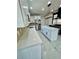 Bright kitchen with center island, modern appliances and white countertops at 3499 Lake Mill Rd, Buford, GA 30519