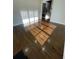Inviting living room with hardwood floors and abundant natural light at 3499 Lake Mill Rd, Buford, GA 30519
