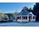 Community pool house with seating, restrooms, and easy access to the gated swimming pool at 3499 Lake Mill Rd, Buford, GA 30519