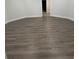Spacious room with modern wood-look floors and neutral wall paint at 3499 Lake Mill Rd, Buford, GA 30519