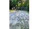 Backyard with a sandy volleyball court and playground set at 3499 Lake Mill Rd, Buford, GA 30519