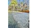 Backyard with a volleyball net set up on a sand court, perfect for outdoor recreation at 3499 Lake Mill Rd, Buford, GA 30519