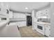 Kitchen featuring white cabinets and stainless steel appliances at 221 The Esplanade Se Way, Loganville, GA 30052