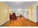 Spacious basement with hardwood floors, white cabinets, and recessed lighting at 3369 Arbor Path Dr, Atlanta, GA 30340