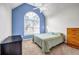 Cozy bedroom with carpeted floors, high ceiling, and a large arched window for ample light at 3369 Arbor Path Dr, Atlanta, GA 30340