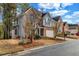 Lovely two-story home with a well-maintained lawn and mature trees in a quiet neighborhood at 3369 Arbor Path Dr, Atlanta, GA 30340