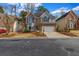 Attractive home featuring brick and gray siding, a two-car garage, and a nicely maintained lawn at 3369 Arbor Path Drive Dr, Atlanta, GA 30340