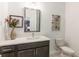 Clean, bright bathroom featuring a modern vanity, toilet, and stylish decor at 388 Pratt Se Dr # 2134, Atlanta, GA 30315