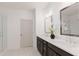 Modern bathroom featuring double sinks, elegant fixtures, and a glass-enclosed shower at 388 Pratt Se Dr # 2134, Atlanta, GA 30315