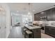 Modern kitchen with stainless steel appliances and an island with barstool seating at 388 Pratt Se Dr # 2134, Atlanta, GA 30315