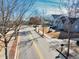 Neighborhood street view with sidewalks and street signage in a suburban community on a bright sunny day at 449 South Hill St., Buford, GA 30518