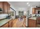 The kitchen leads to the breakfast nook, providing a great layout for entertaining and cooking at 718 Fincher Rd, Covington, GA 30016