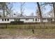 Spacious backyard enclosed by a wooden fence, offering privacy and room for outdoor activities at 2508 Brookwood Ne Dr, Atlanta, GA 30305
