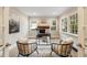 Bright office space with a fireplace, large windows, and stylish decor, ideal for remote work at 2508 Brookwood Ne Dr, Atlanta, GA 30305