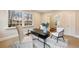 Bright office space with a fireplace, large windows, and stylish decor, ideal for remote work at 2508 Brookwood Ne Dr, Atlanta, GA 30305
