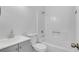 Updated bathroom with modern fixtures, white vanity, and shower-tub combination at 2964 Hollow Ln, Powder Springs, GA 30127