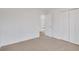 Bedroom with plush carpeting and a closet at 2964 Hollow Ln, Powder Springs, GA 30127