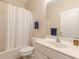 This bathroom has a shower and tub combination with a white sink and vanity at 4479 Caleb Xing, Powder Springs, GA 30127