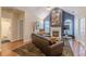 Inviting living room with high ceilings, a fireplace, and hardwood floors at 4479 Caleb Xing, Powder Springs, GA 30127