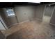 Unfinished basement with a window for natural light, providing a blank canvas for customization at 4973 Horton Pl, Douglasville, GA 30135