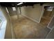 Unfinished basement space with exposed ceiling and concrete floors at 4973 Horton Pl, Douglasville, GA 30135