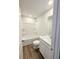 Clean bathroom featuring a tub/shower combo, single sink, and wood-look flooring at 2359 Brown Dove Way (Lot 2), Grayson, GA 30017