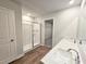 Bathroom with double sinks, walk-in shower, and walk-in closet at 2359 Brown Dove Way (Lot 2), Grayson, GA 30017