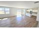 Bright and airy open floor plan with lots of windows, hard surface floors, and an open kitchen at 2359 Brown Dove Way (Lot 2), Grayson, GA 30017