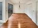 Dining room featuring hardwood floors, sliding door to deck and a pendant light at 80 Colony Ridge Dr, Alpharetta, GA 30022