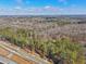 Expansive treed lot provides privacy and natural beauty for the home at 9865 Buice Rd, Alpharetta, GA 30022