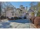 Exterior of home with a large backyard pool and deck at 9865 Buice Rd, Alpharetta, GA 30022