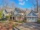 Lovely home with a long driveway leading to a beautiful attached garage at 9865 Buice Rd, Alpharetta, GA 30022