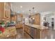 Bright and spacious kitchen featuring stainless steel appliances, granite counters, and ample cabinet space at 9865 Buice Rd, Alpharetta, GA 30022