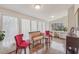 Inviting living room featuring windows that let in natural light and neutral furniture at 9865 Buice Rd, Alpharetta, GA 30022