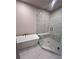 Luxurious bathroom featuring a soaking tub and separate glass-enclosed shower at 1055 Dryden Ln # 10, Atlanta, GA 30319