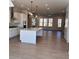 Open living area showcasing kitchen, dining, and living spaces with abundant natural light at 1055 Dryden Ln # 10, Atlanta, GA 30319