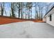 Large backyard with a fenced in lawn, wooden deck, landscaped area and plenty of room to entertain at 2670 Thornbury Way, Atlanta, GA 30349