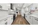 Modern kitchen featuring white cabinets, subway tile backsplash, and stainless steel appliances at 2670 Thornbury Way, Atlanta, GA 30349